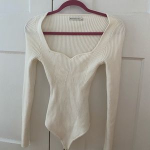 Never worn Abercrombie & Fitch white long sleeve body suit.